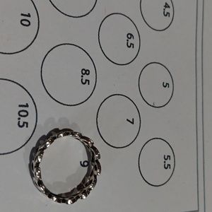 Four Faux Silver Rings